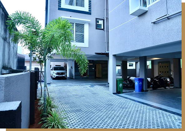 parking facilities at the Maangudi Enclave apartments in Dindigul